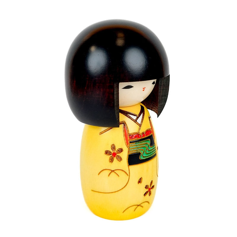 Yellow Kokeshi doll